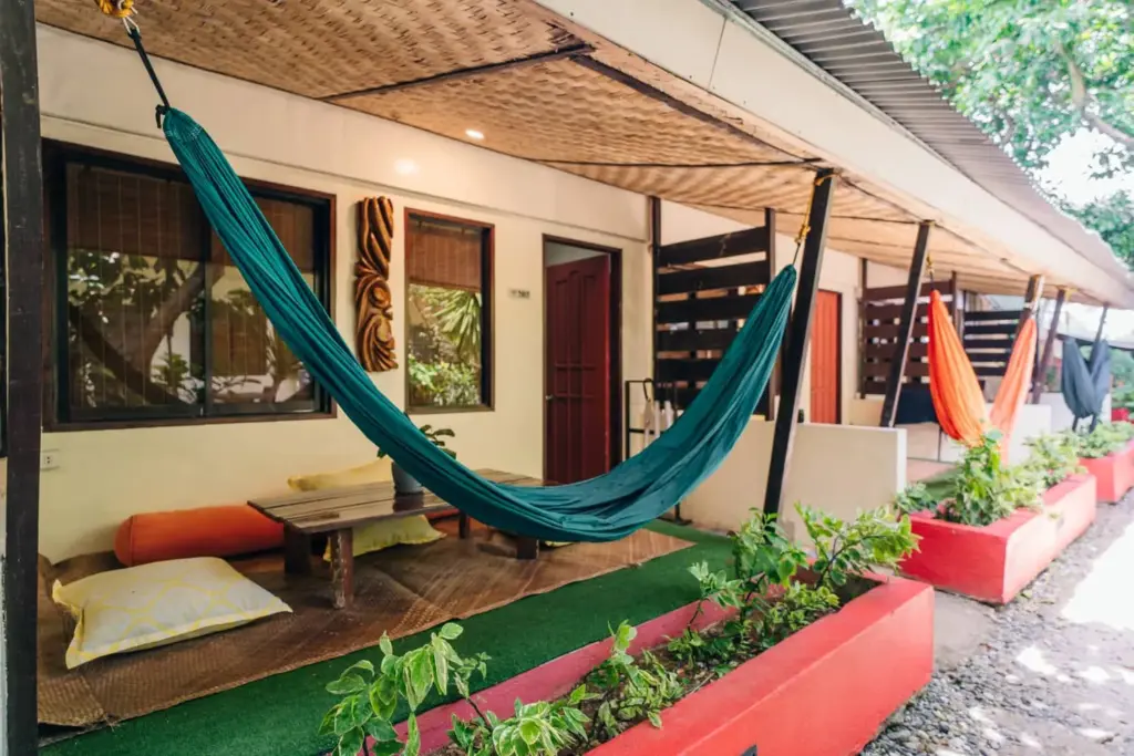 Hammocks strung across the shaded terraces