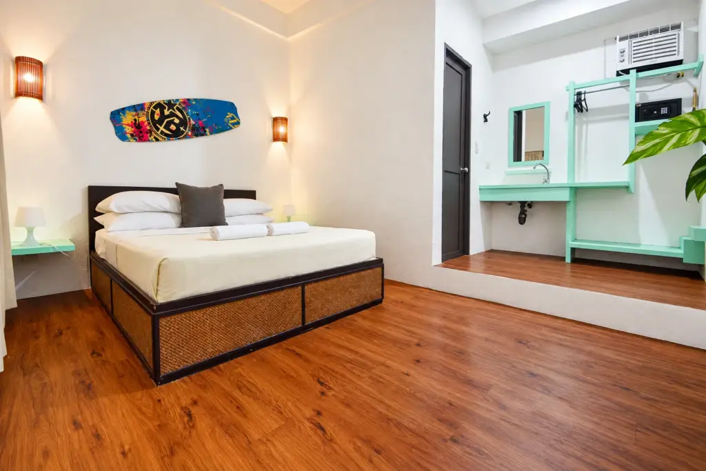 Standard Queen bed and the mint vanity with open shelving
